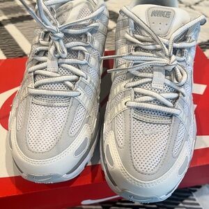 Nike women’s  Gray and White Sneakers